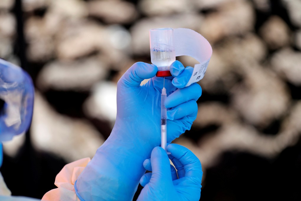 A health worker fills a syringe with Ebola vaccine in Goma, Democratic Republic of Congo. Photo: Reuters