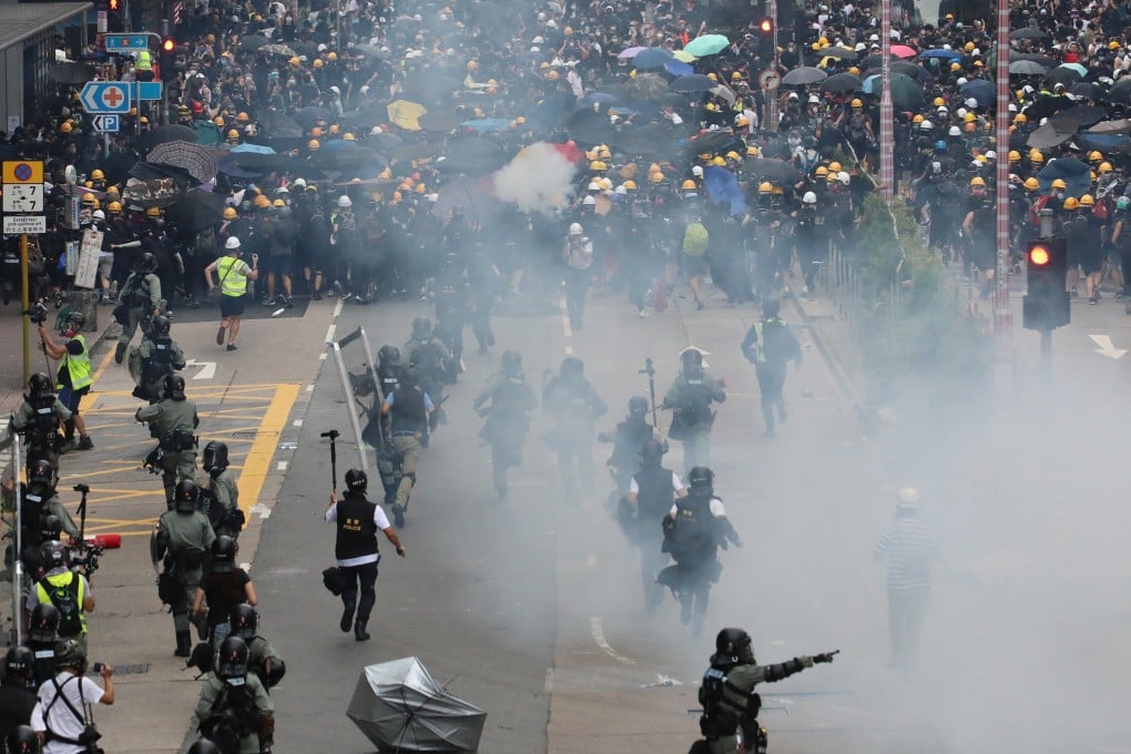 Anti-government protesters and riot police clash in Sham Shui Po on Sunday. Reda says the violent protests over the last two months have worsened the city’s economic slump and eroded its core values. Photo: Felix Wong