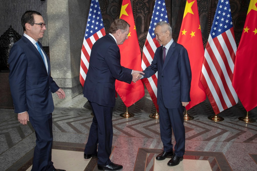 US Trade Representative Robert Lighthizer shakes hands with Chinese Vice-Premier Liu He at the Xijiao Conference Centre in Shanghai on July 31. Chinese and US negotiators held talks in Shanghai in a bid to bring the year-long trade war to an end. Photo: AFP
