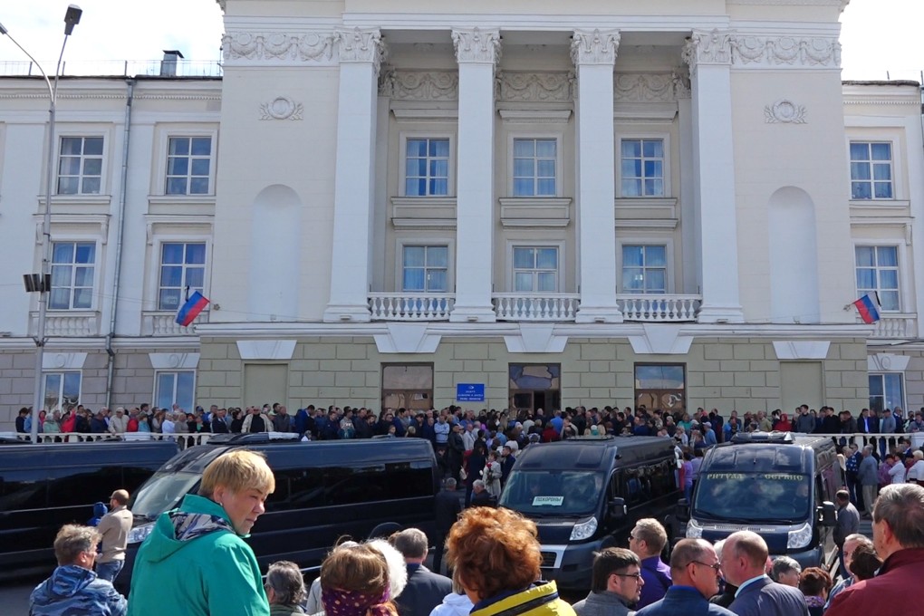 A screen grab from footage of the funerals on Monday of five Russian nuclear engineers killed by a rocket explosion in Sarov. Photo: Rosatom via AP