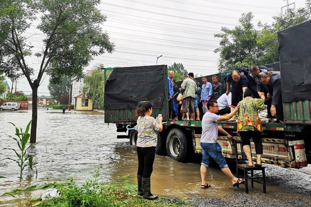 Villagers are evacuated from Zouping, in Shandong, on Monday. Tencent Video has apologised for sending a message saying nearly everyone in the province had been killed in the typhoon. Photo: Xinhua