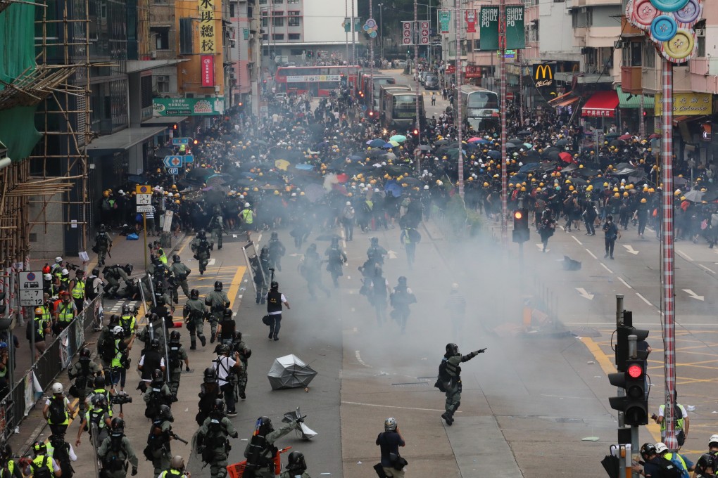 The anti-government protests and the US-China trade war are already weighing on Hong Kong’s economy, now it is set to feel the pressure of a weaker Chinese yuan. Photo: Felix Wong
