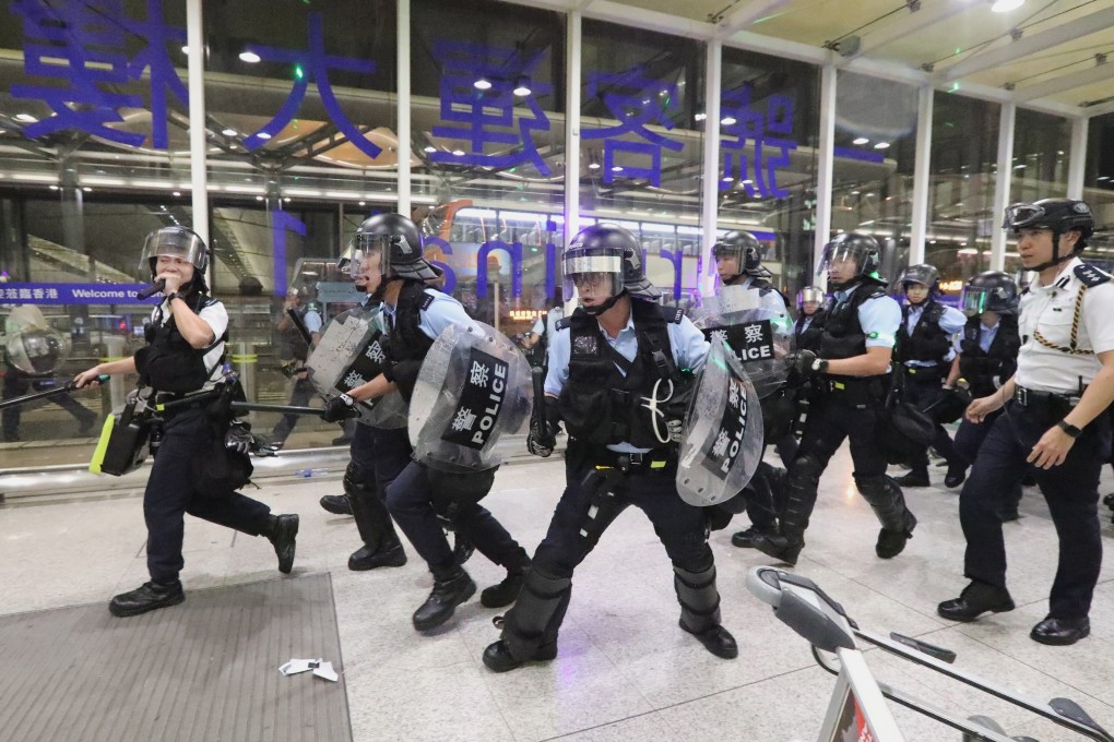 Riot police at the airport. Photo: Felix Wong