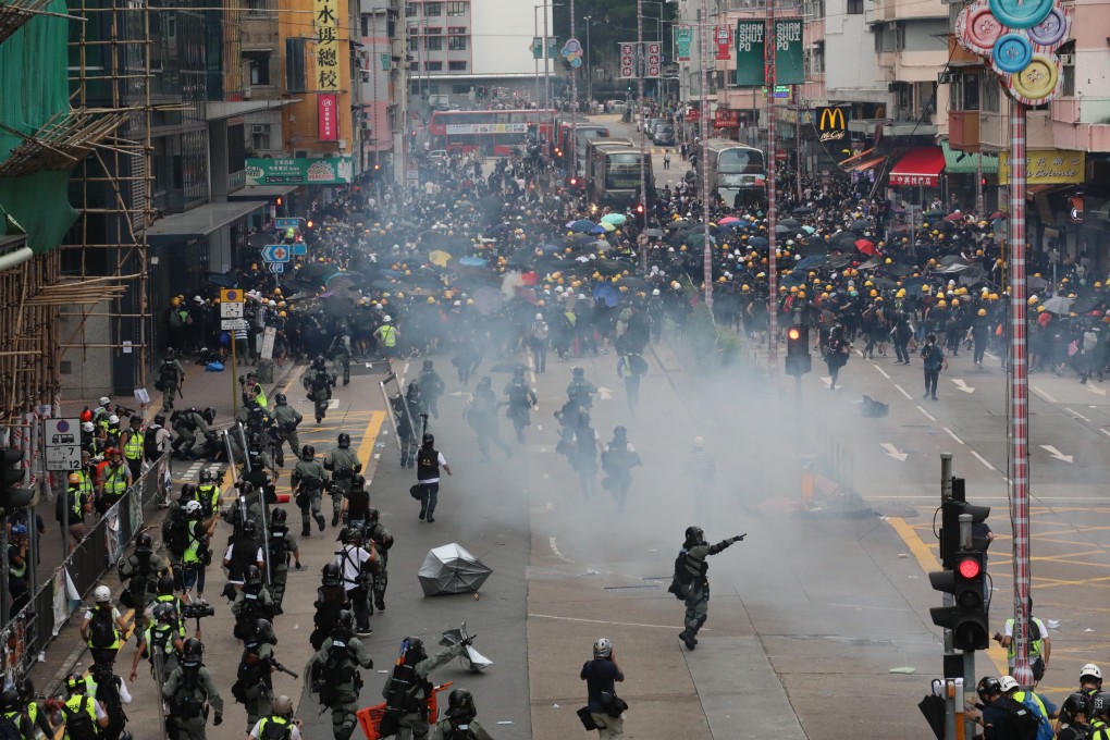 Hong Kong police fire tear gas at anti-government protesters, in scenes that have become increasingly regular. Photo: Felix Wong