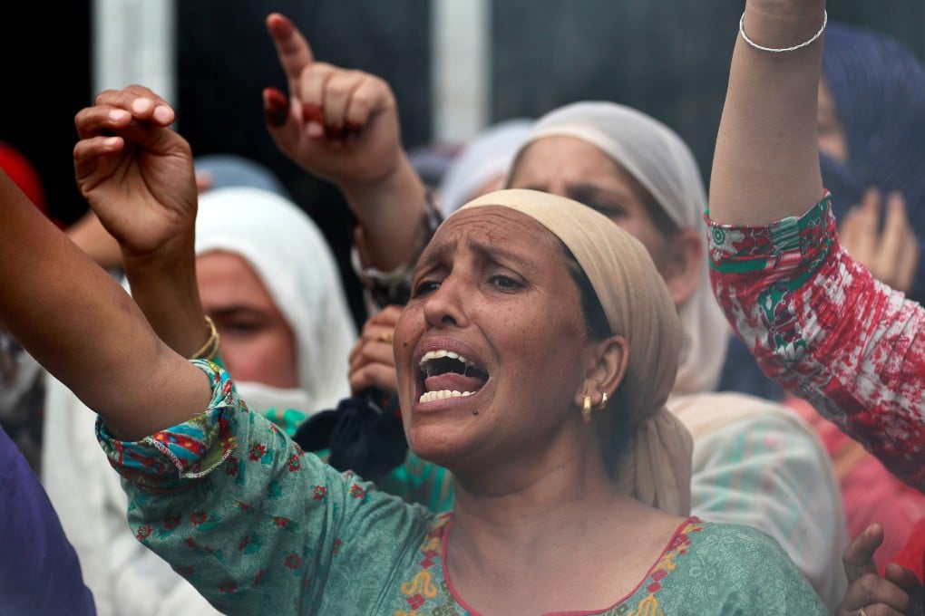 A woman shouts slogans during a protest in Srinagar on Wednesday. Photo: Reuters