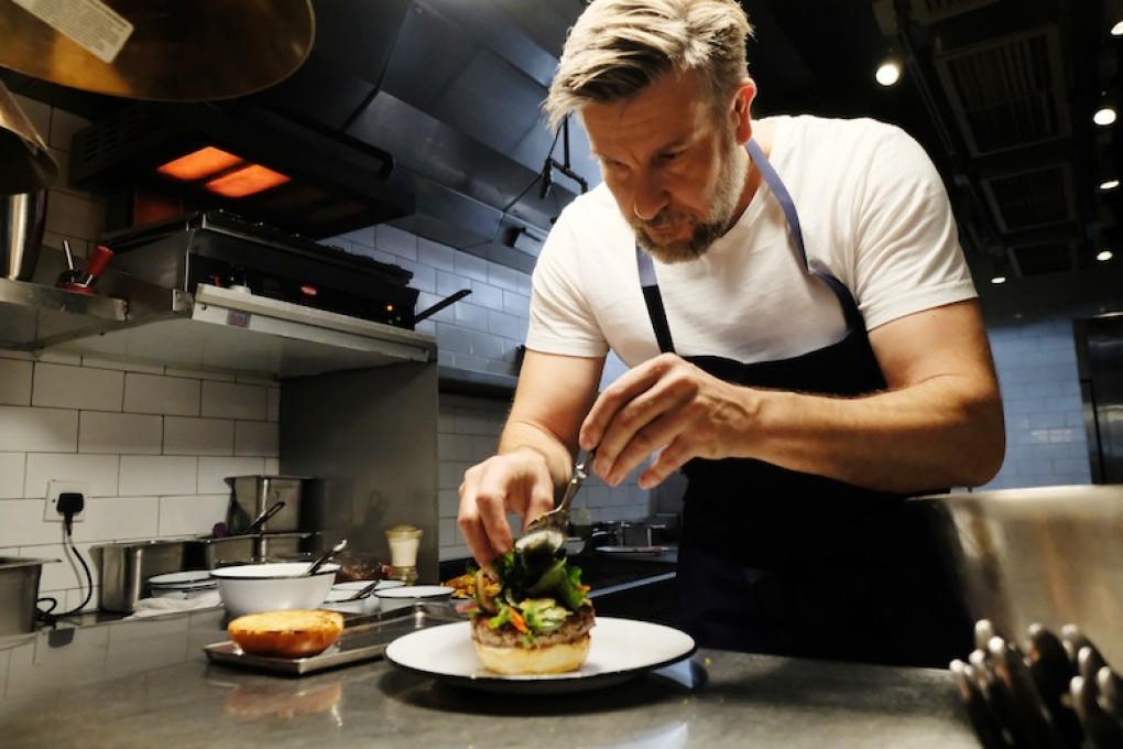 Uwe Opocensky in the kitchen at Beef & Liberty. He joined the Hong Kong burger restaurant chain as group executive chef three years ago after nearly a decade at the Mandarin Oriental Hong Kong hotel, and later opened Restaurant Uwe. The German is returning to the hotel trade.