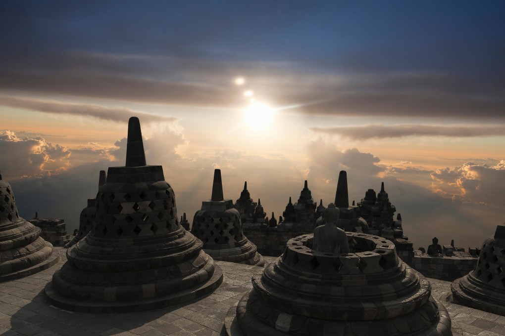 F11G0T Spires on Temple of Borobudur at sunset, Borobudur, Indonesia