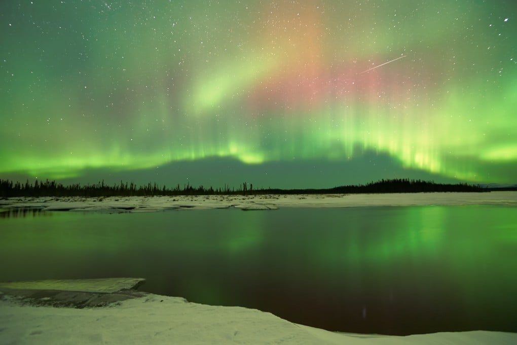 The Northern Lights over a lake in Fairbanks, Alaska. Photo: Shutterstock