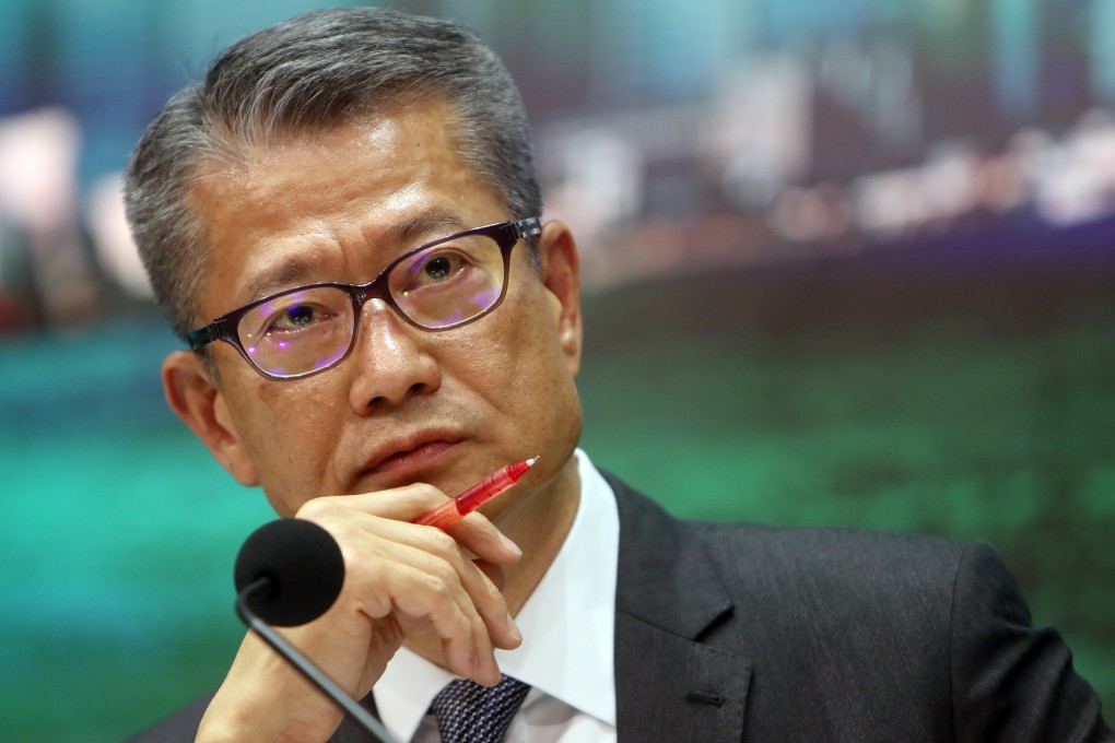 Financial Secretary Paul Chan announces a basket of extra budget measures. Photo: Winson Wong