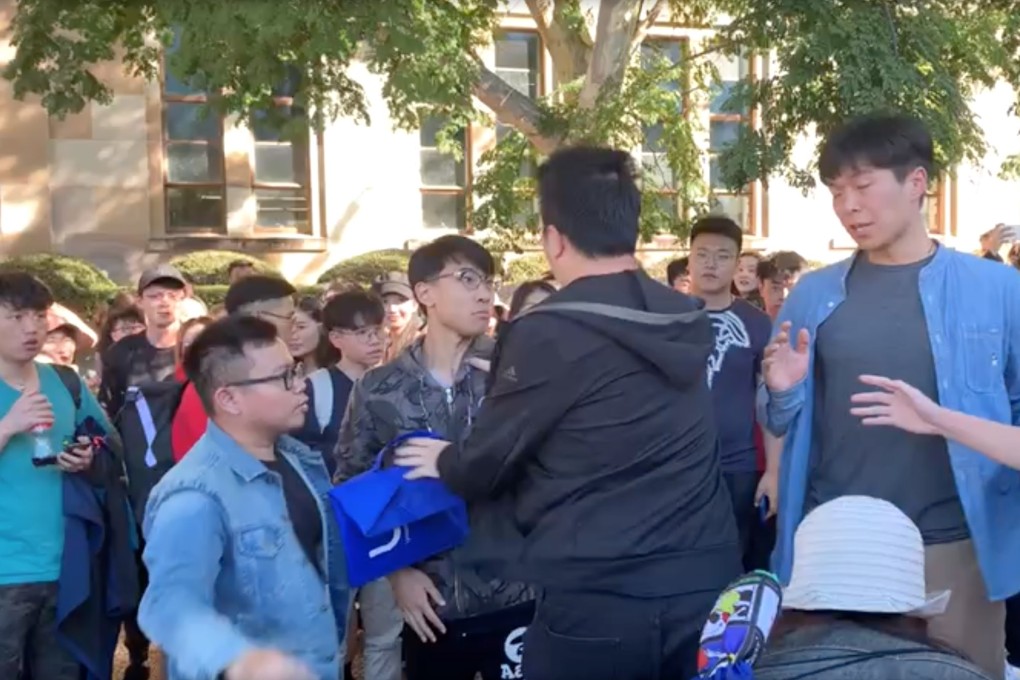 Hong Kong and mainland Chinese students clash during a pro-democracy protest at the University of Queensland in Australia. Photo: Handout
