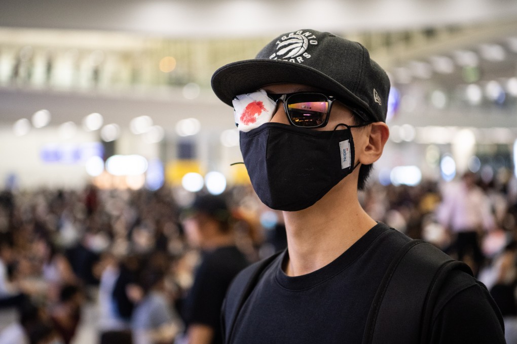 A young protester at the Hong Kong International Airport on August 13. Photo: EPA-EFE