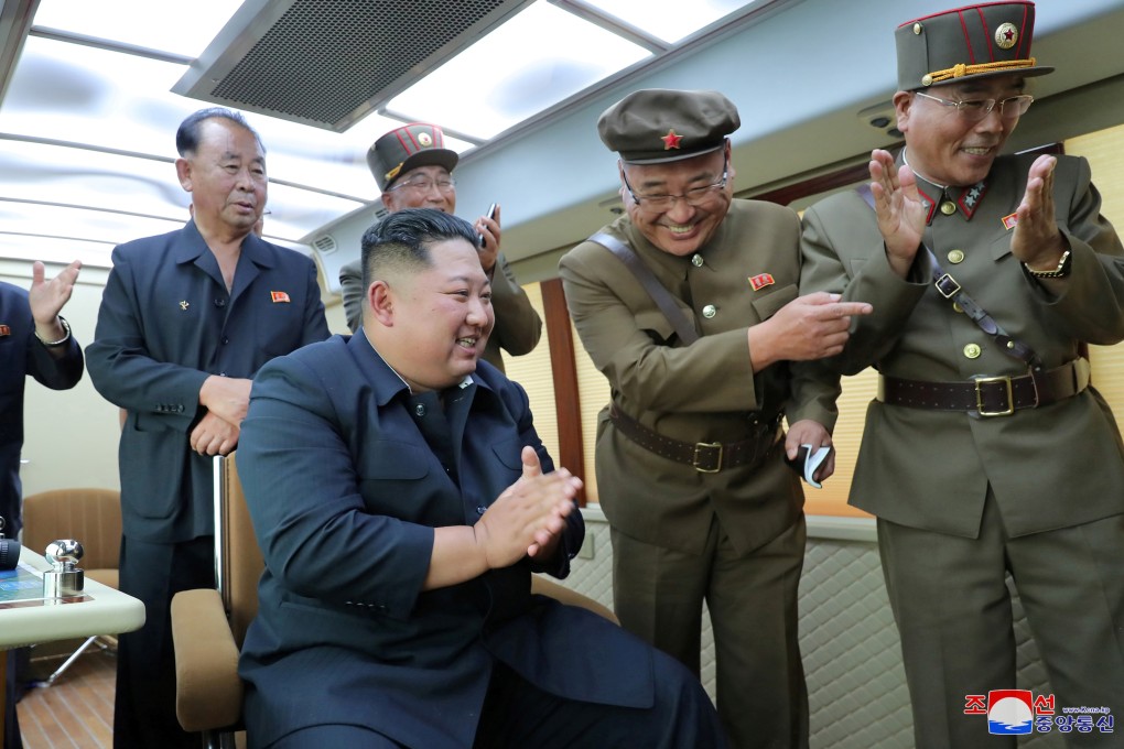 North Korean leader Kim Jong-un guides the test firing of a new weapon in an undated photo released on Friday. Photo: KCNA via Reuters
