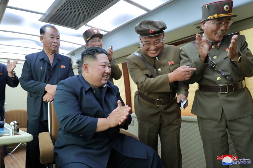 North Korean leader Kim Jong-un guides the test firing of a new weapon in an undated photo released on Friday. Photo: KCNA via Reuters