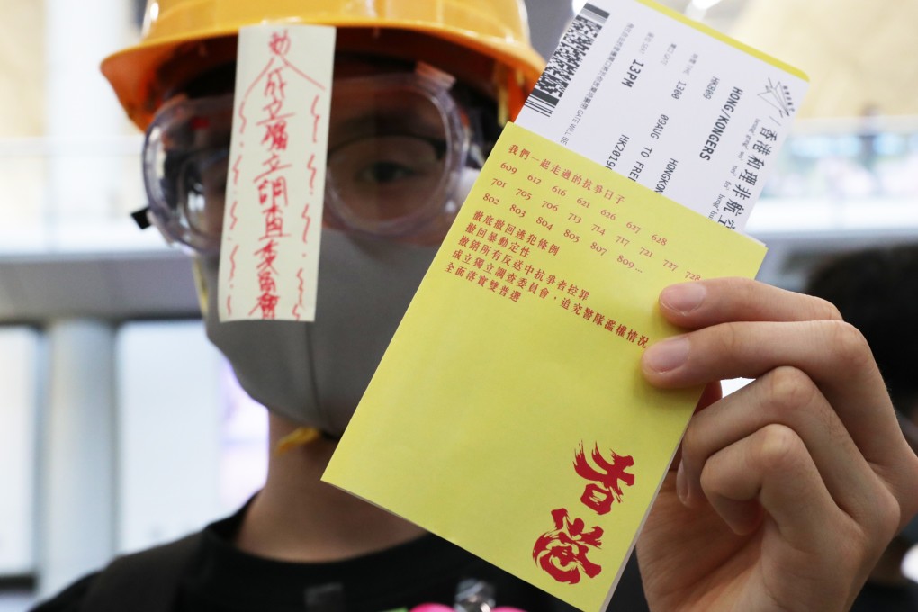 Protesters printed yellow “passports” and “boarding passes” to distribute at Hong Kong International Airport on August 9. Through Lennon Walls, memes, posters and many other ways, Hong Kong’s young protesters have shown the world their creativity and ingenuity. Photo: Edmond So
