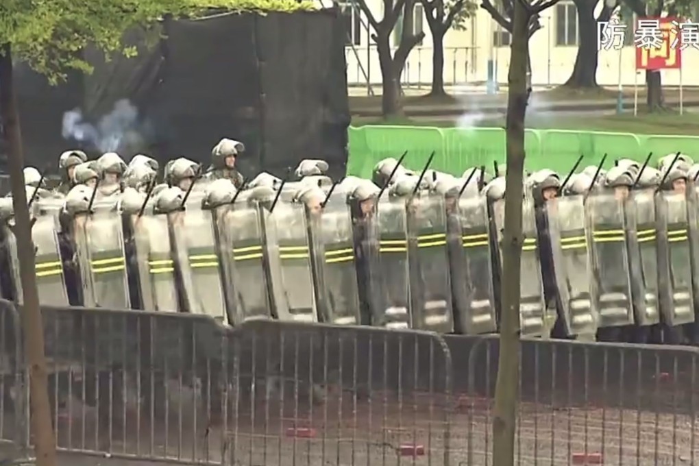 An undated screengrab shows soldiers of the Hong Kong garrison of the People’s Liberation Army conducting an anti-riot drill in the city. Photo: Handout