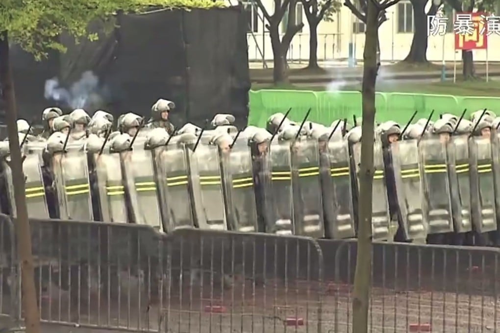 An undated screengrab shows soldiers of the Hong Kong garrison of the People’s Liberation Army conducting an anti-riot drill in the city. Photo: Handout