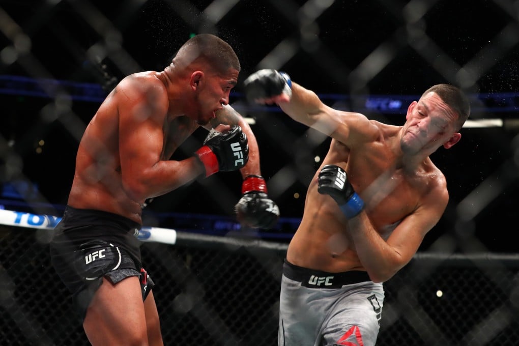 Nate Diaz throws a punch at Anthony Pettis in the second round. Photo: AFP