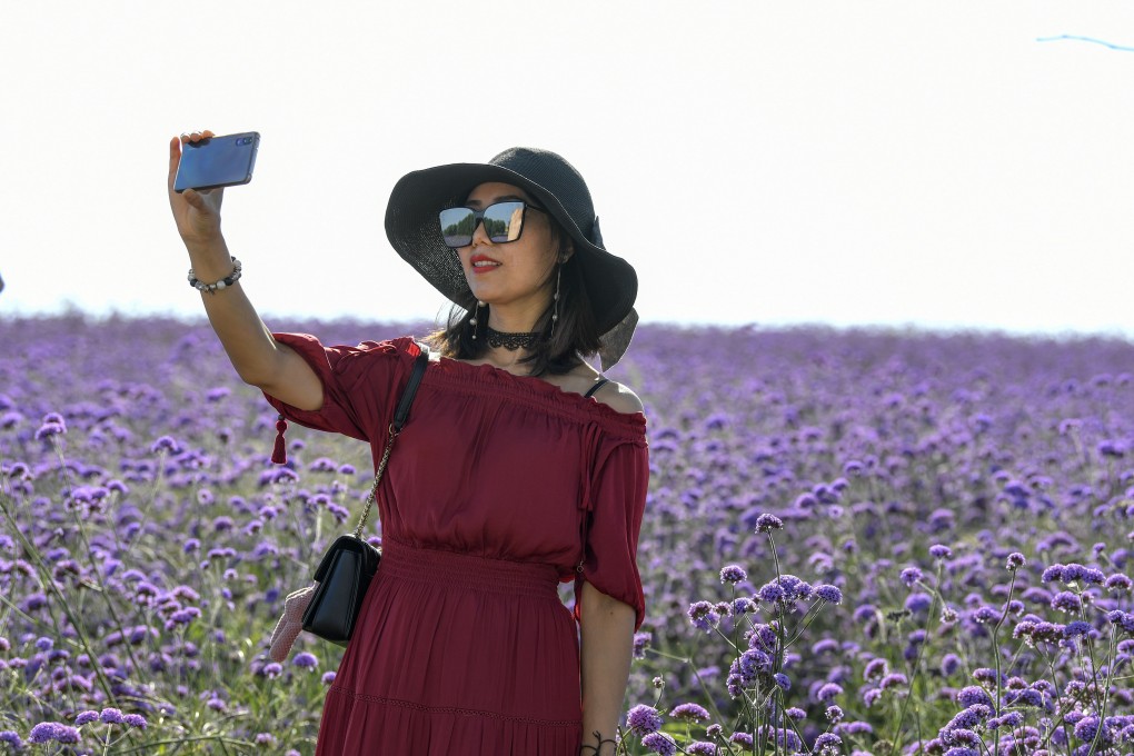A tourist in China’s northwestern Ningxia Hui autonomous region. The country’s tourism sector is actually growing at a faster rate, says Qian Jiannong, the Fosun Tourism chairman. Photo: Xinhua