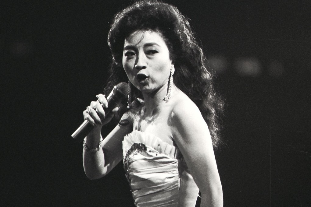 Canto-pop singer Paula Tsui performing during her heyday at the Hong Kong Coliseum. Photo: SCMP