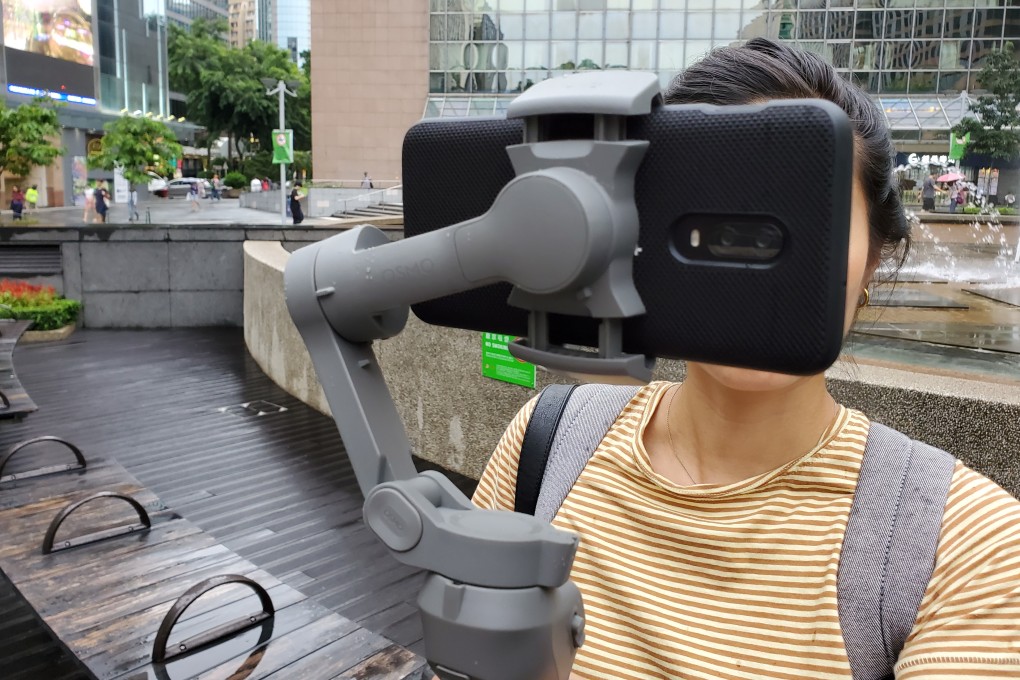 DJI moved the hinge of the Osmo Mobile 3’s motor arm to the side of the phone instead of in front of it, so phones with wide-angle cameras can shoot freely. Other gimbals’ motor arms tend to obstruct the view of wide-angle cameras. Photo: Ben Sin