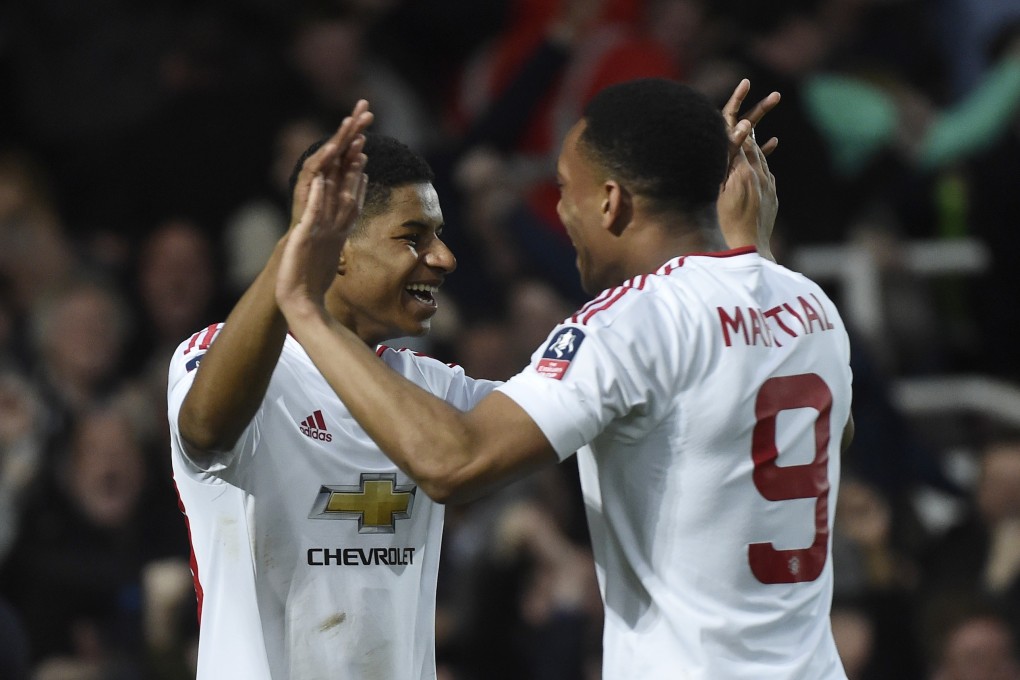 Marcus Rashford celebrates with Anthony Martial after scoring in the FA Cup in 2016. Photo: Reuters