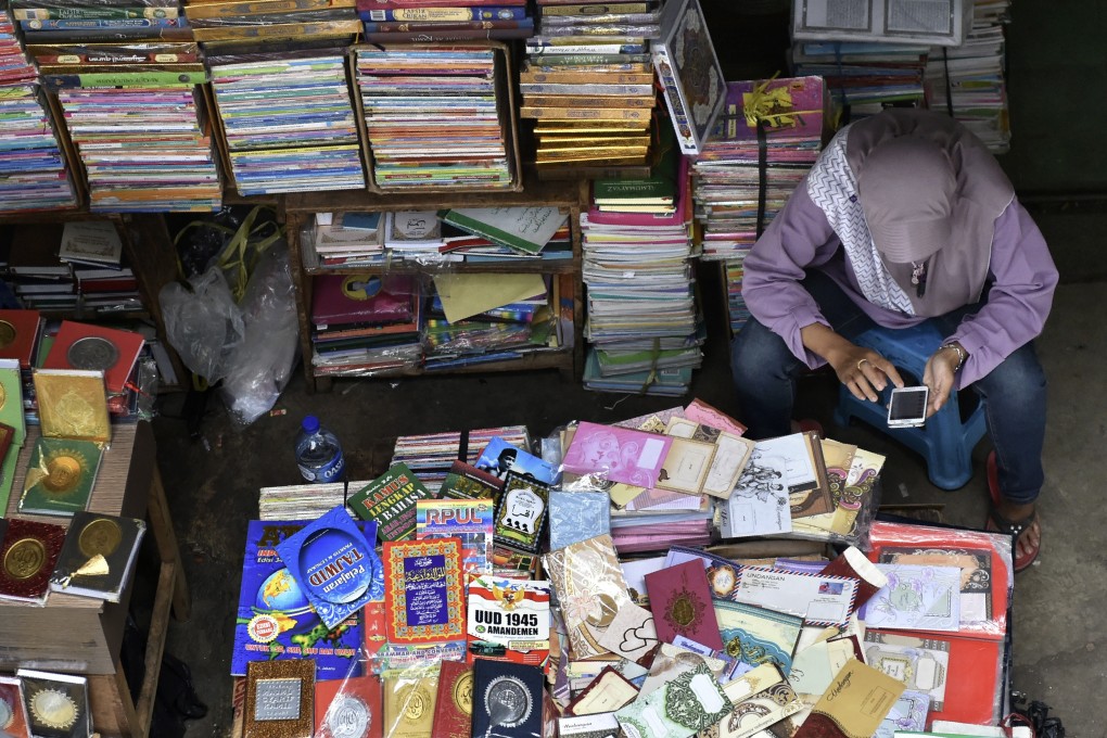 The currency war has impacted Indonesian financial markets, with the value of the rupiah dropping more than 2 per cent since US-China trade negotiations earlier this month. Photo: AFP
