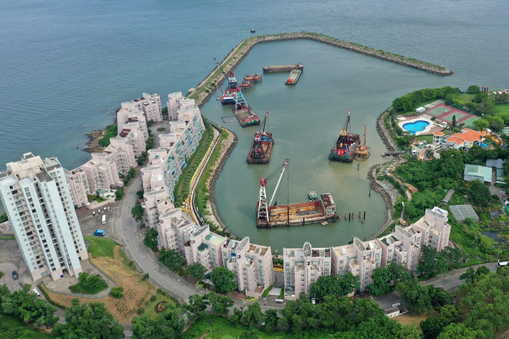 An aerial view of Discovery Bay. Yacht broker Anthony Rendall says the triangular harbour is too small for superyachts that need a lot of space to manoeuvre. Photo: Roy Issa