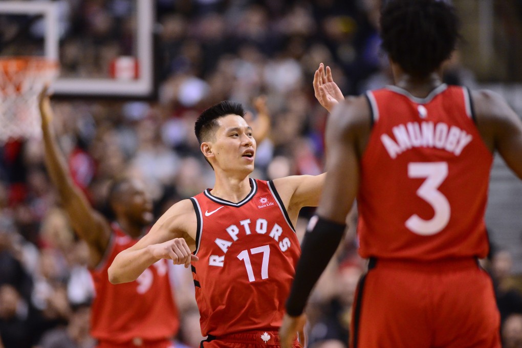 Toronto Raptors guard Jeremy Lin (No 17) celebrates a basket against the Washington Wizards. Photo: AP