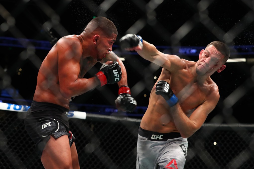 Nate Diaz throws a punch at Anthony Pettis in the second round of their UFC 241 fight. Photo: AFP
