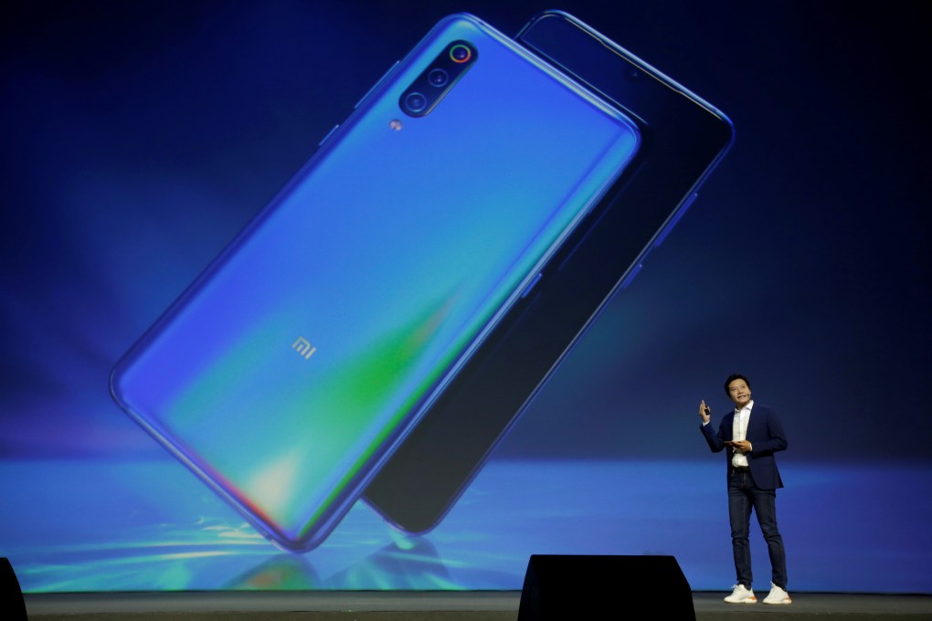 Xiaomi Corp founder, chairman and chief executive Lei Jun presents the company’s Mi 9 smartphone at its launch event in Beijing on February 20, 2019. Photo: Reuters