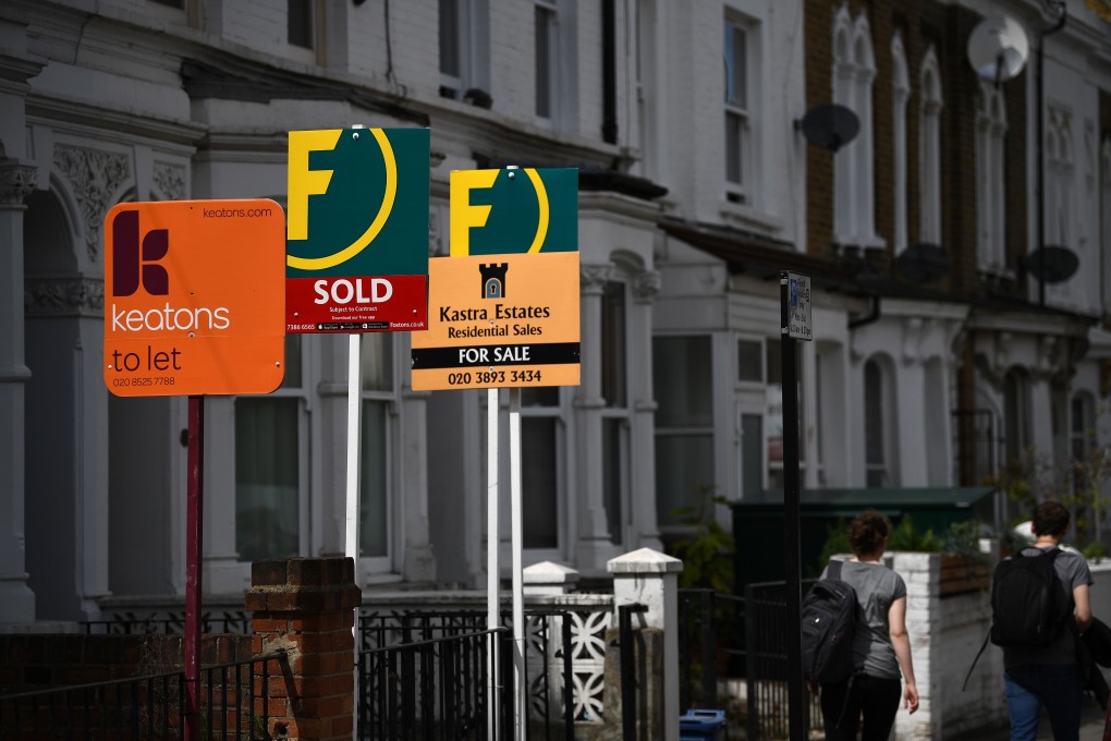 Estate and rental agents' boards are pictured on a residential street in Hackney, east London on August 9, 2019. Photo: Agence-France Presse