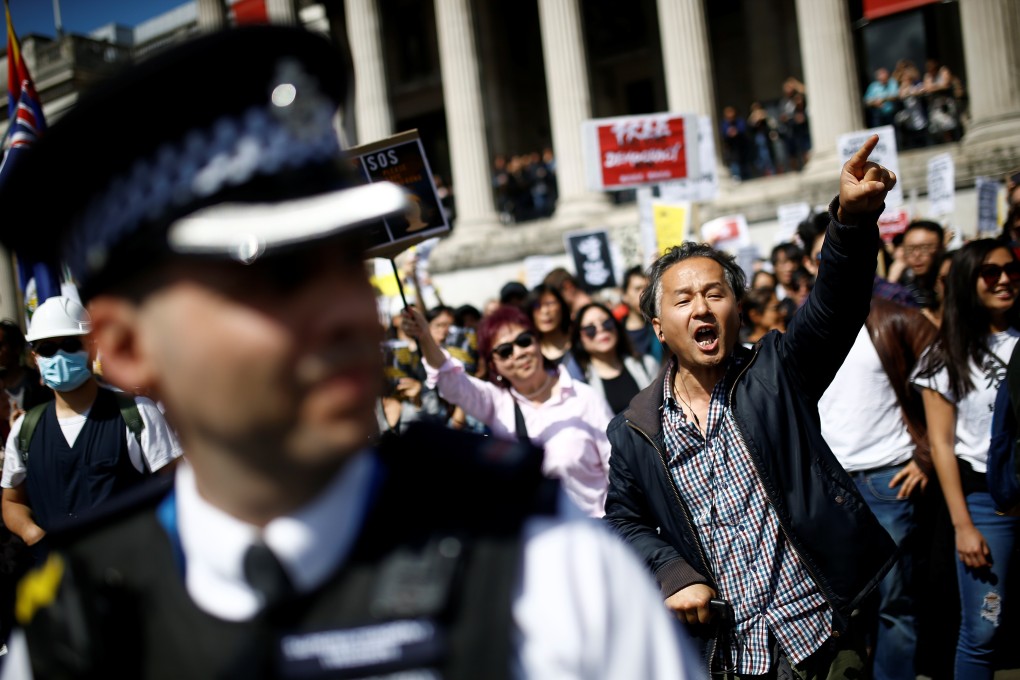 Supporters of the protests in Hong Kong take part in a march in London on August 17. There has been a wave of support across the world for protesters in Hong Kong. Photo: Reuters