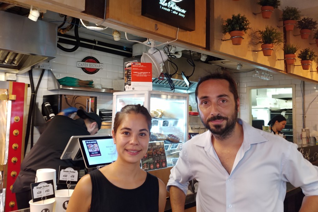 From left, Marie Ranc and Jerome Carlier of roast chicken takeaway La Rotisserie at one of their shops in Hong Kong’s Sheung Wan district. Photo: Enoch Yiu