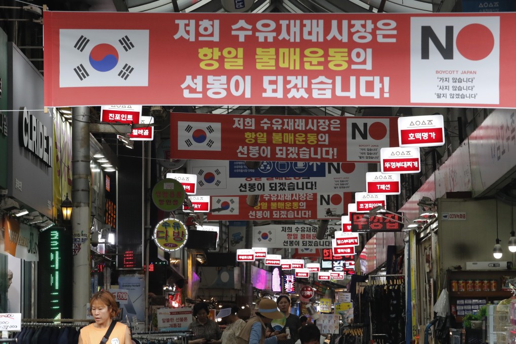 Banners calling for a boycott of Japanese products are displayed inside a market in Seoul, South Korea, after Tokyo tightened its exports of materials used to manufacture semiconductors and display screens. Photo: AP