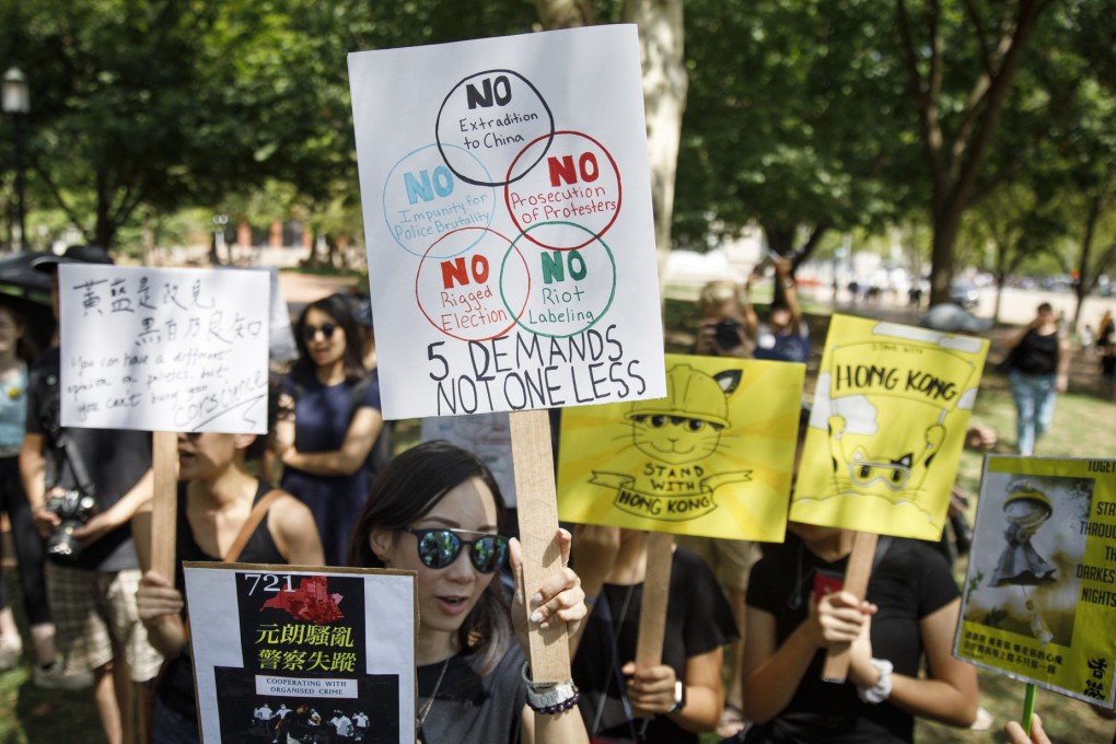 Demonstrators in Lafayette Square in front of the White House in Washington on August 18 show solidarity with the “Stand With Hong Kong, Power to the People Rally” in Hong Kong. Photo: AP