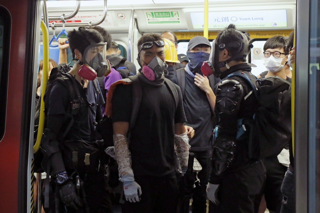 Anti-government protesters were out in force at Yuen Long MTR station on Wednesday night. Photo: AP