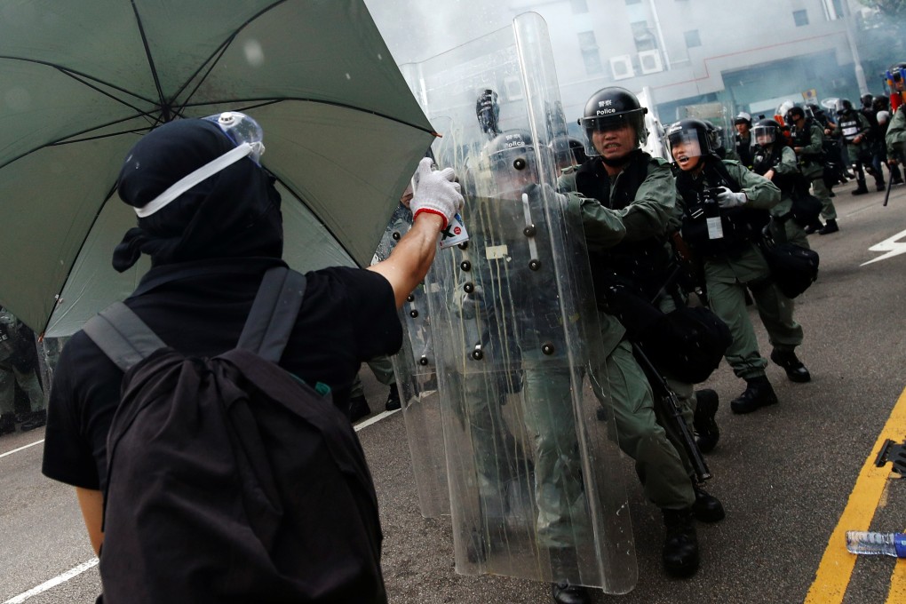 Demonstrators in Yuen Long clash with police during a protest against the Yuen Long attacks. , in Yuen Long.Photo: Reuters