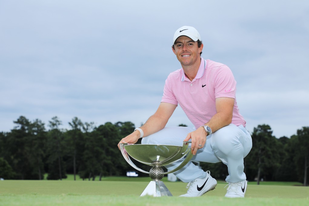 Rory McIlroy poses with the FedExCup trophy 12 months after the disappointment of last season’s edition. Photo: AFP