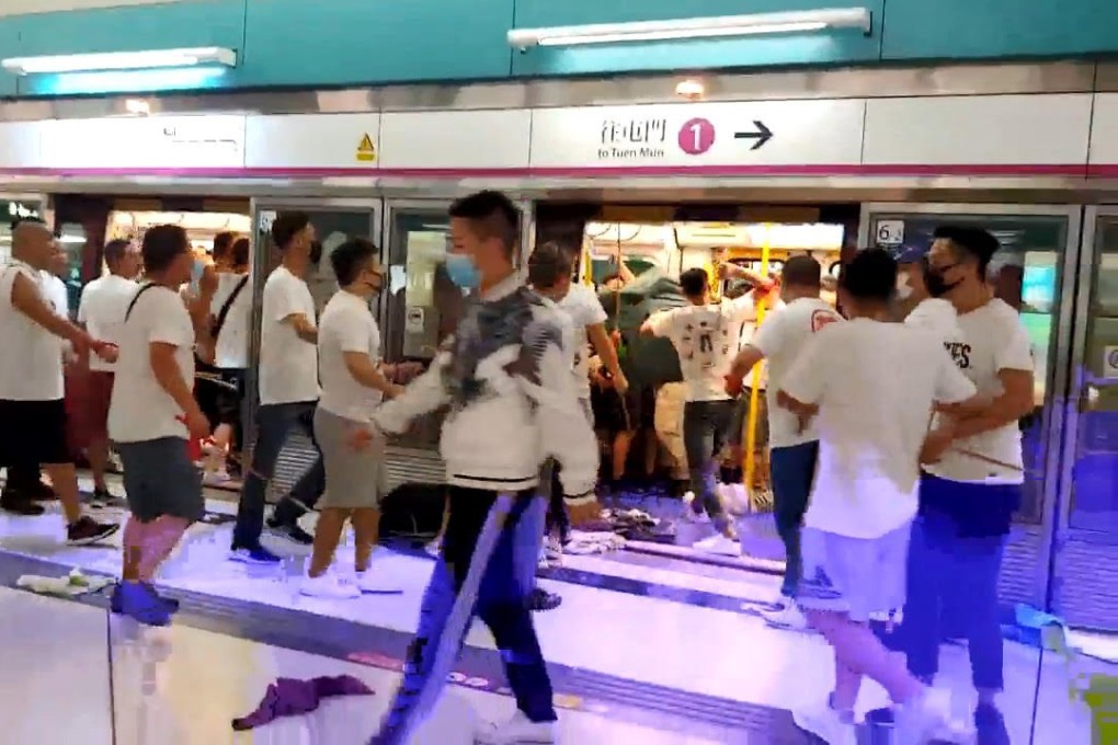 Protesters and other passengers are attacked at Yuen Long MTR station. Photo: SCMP