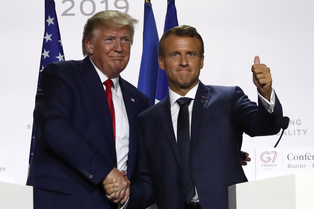 US President Donald Trump and French President Emmanuel Macron shake hands after their joint news conference at the Group of Seven summit meeting on Monday in Biarritz. Photo: AP