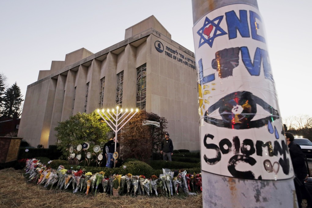 A menorah at a memorial outside the Tree of Life Synagogue, where Robert Bowers killed worshippers in an October 27 shooting. Photo: AP