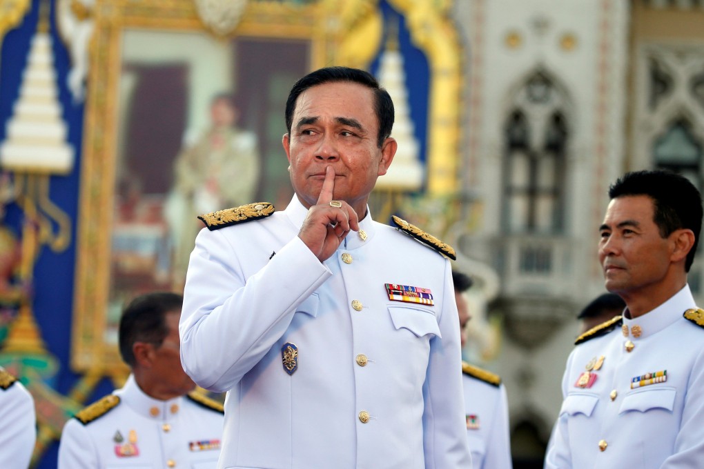 Thailand's Prime Minister Prayuth Chan-ocha with his new government cabinet in Bangkok in July. Photo: Reuters