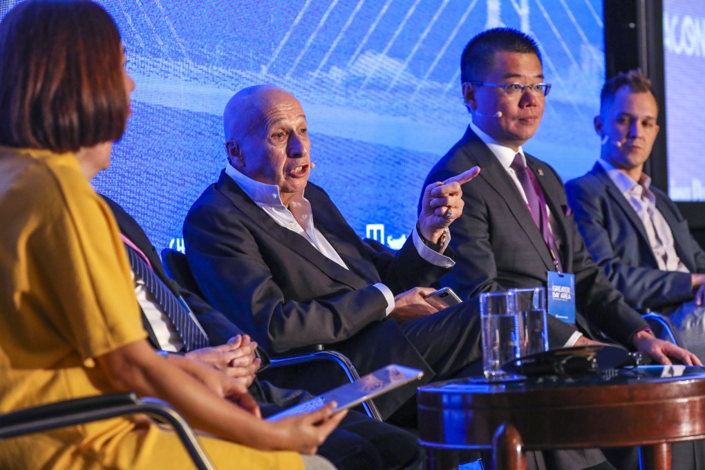 Allan Zeman (second left), chairman of Lan Kwai Fong Group, Witman Hung (second right), principal liaison officer for Hong Kong at the Shenzhen Qianhai Authority and Tony Verb (right), co-founder and partner at GreaterBay Venture & Advisors, take part in a panel discussion titled ‘The competition conundrum’, at the South China Morning Post’s China Conference, on Wednesday. Photo: May Tse