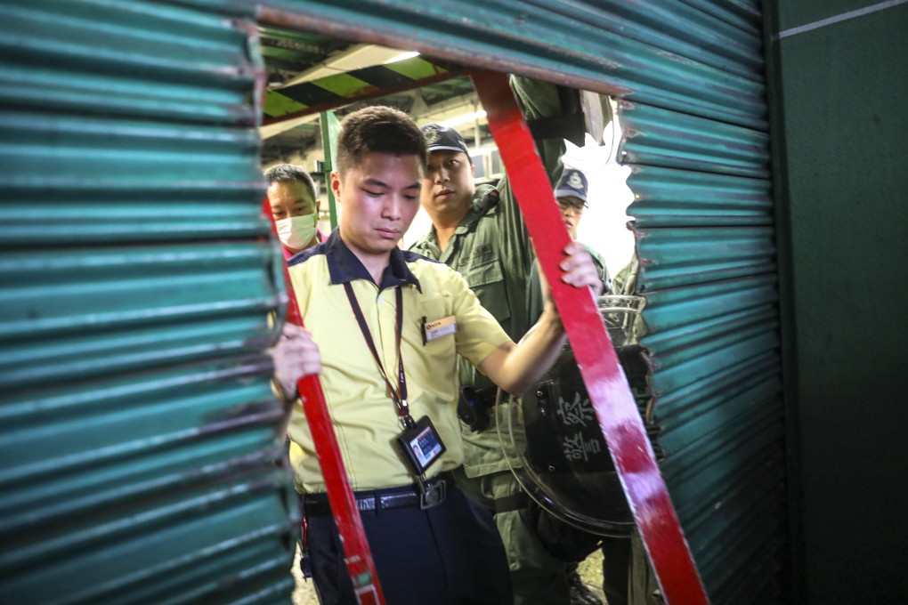 MTR staff shut up Kwai Fong station ahead of the weekend’s protest. Photo: Dickson Lee