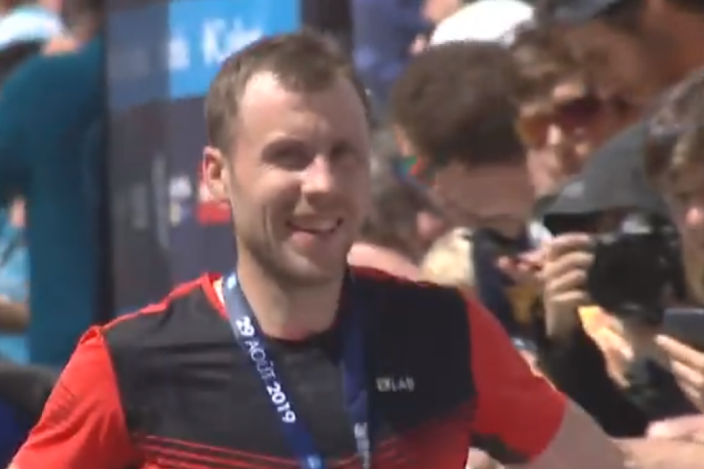 Stian Angermund-Vik wins the OCC and takes a victory lap with the excited fans asking for high fives. Photos: UTMB TV.
