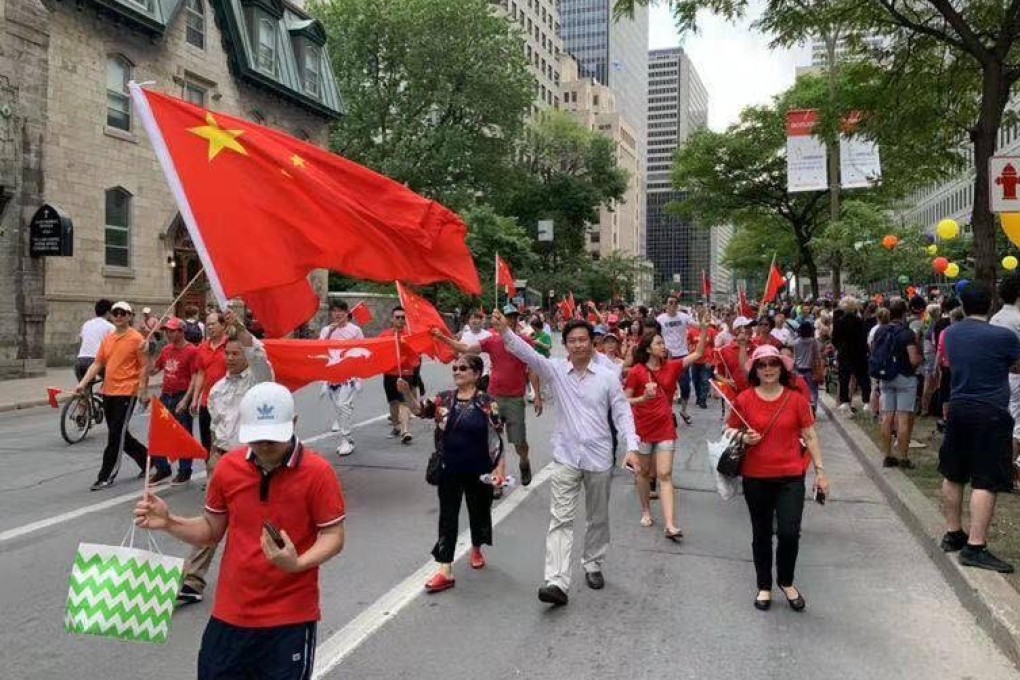 Pro-China protesters walk alongside the Montreal Pride parade on August 18, led by a man dressed in a fashion that mimics the typical Pride garb of Canadian Prime Minister Justin Trudeau. Photo: Free HK MTL