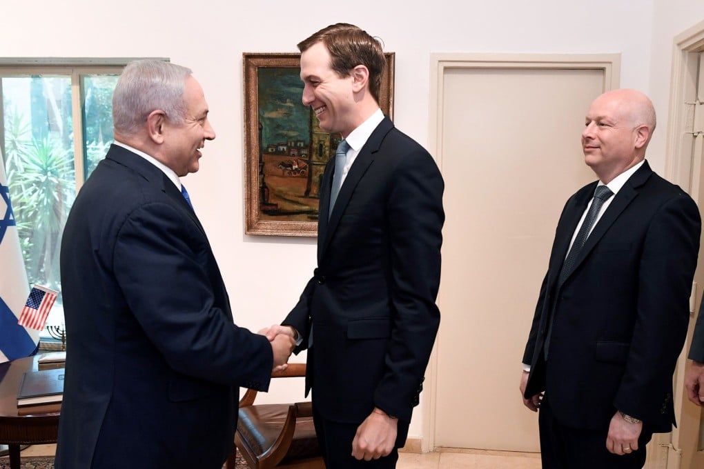 The US president’s son-in-law and adviser, Jared Kushner (C) shaking hands with Israeli Prime Minister Benjamin Netanyahu (L) as US special representative for international negotiations, Jason Greenblatt looks on. Photo: AFP