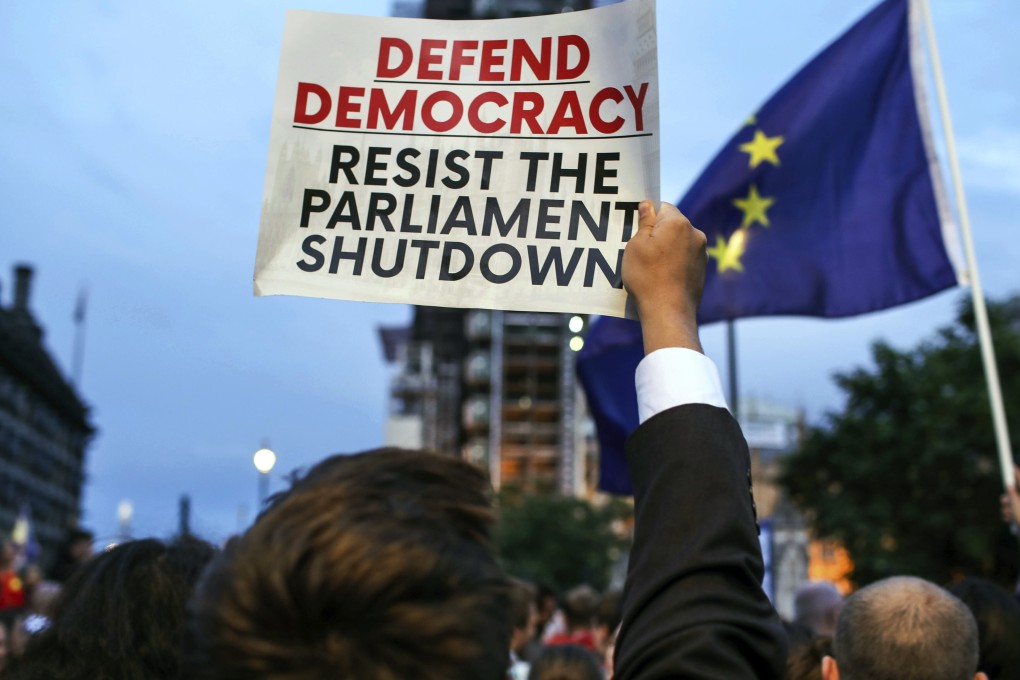 Anti-Brexit supporters take part in a protest in front of the Houses of Parliament in central London. Photo: AP