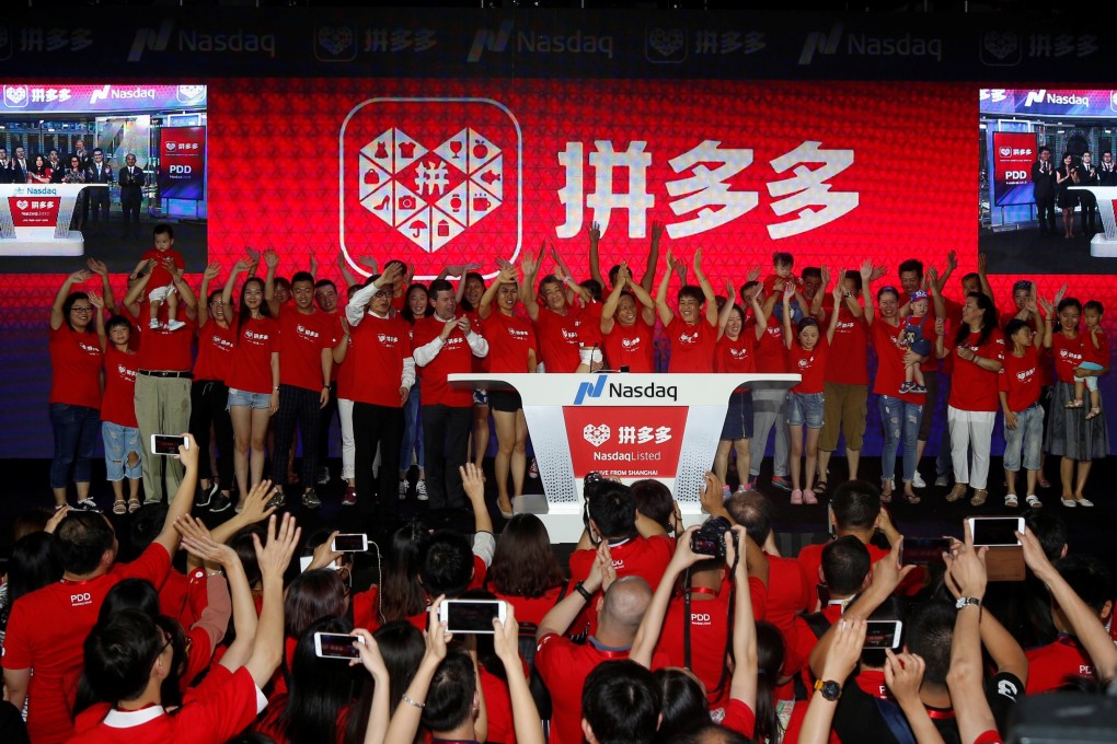 Users of online group discounter Pinduoduo wave after ringing the opening bell on the Nasdaq Stock Market in New York during an event in Shanghai, China July 26, 2018. Photo: Reuters