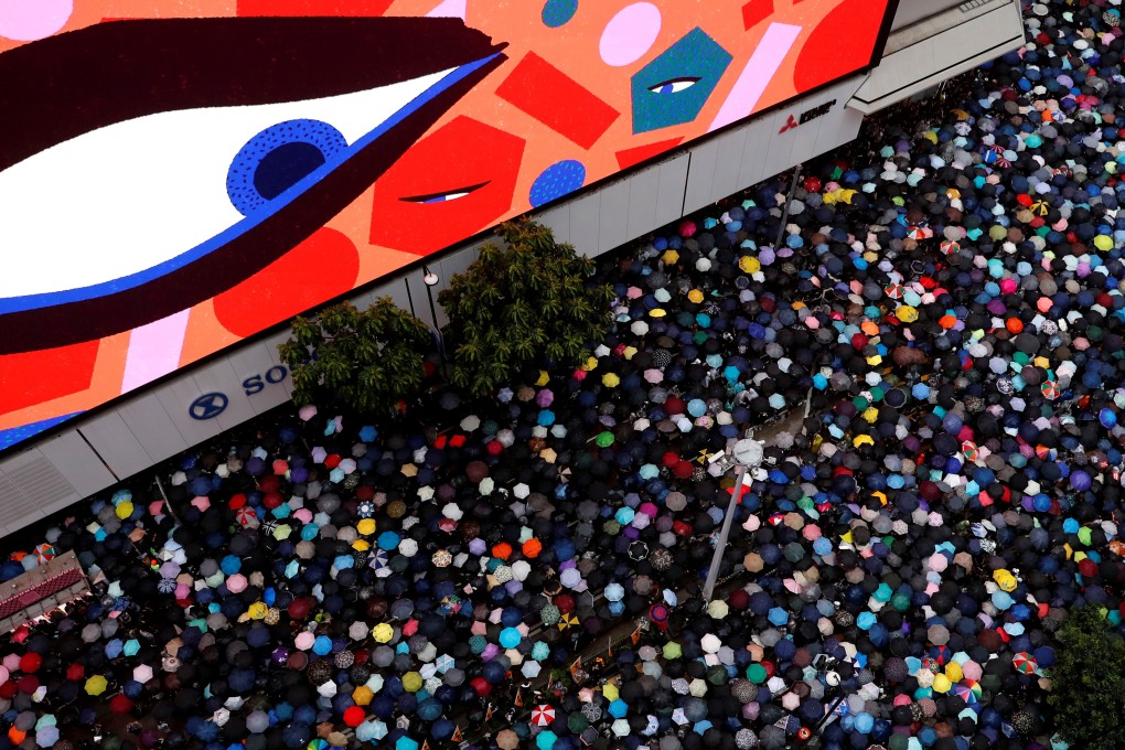 Anti-extradition bill protesters march to demand democracy and political reforms in Hong Kong. Photo: Reuters